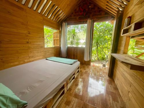 Postel nebo postele na pokoji v ubytování Mèo Home - Bụi Homestay
