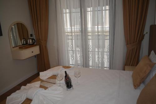 Cama o camas de una habitación en Garden Elisa Hotel