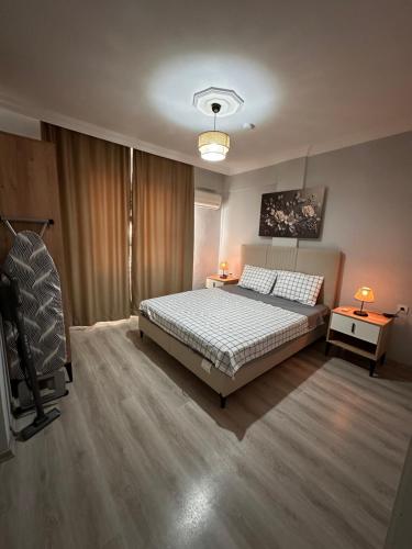Postel nebo postele na pokoji v ubytování AFŞiN HOMES