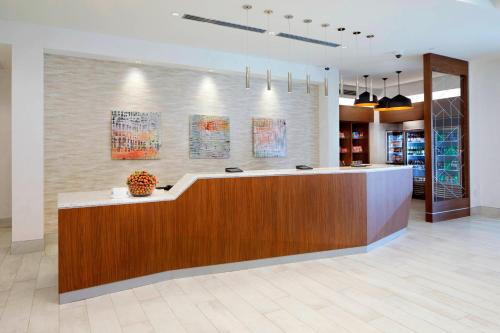a lobby with a reception desk in a building at TownePlace Suites by Marriott Columbus Easton Area in Columbus