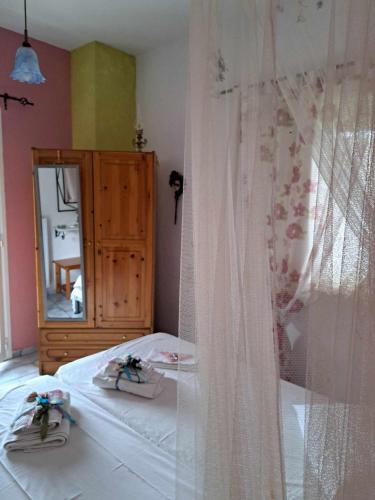 Postel nebo postele na pokoji v ubytování Xenios Milina