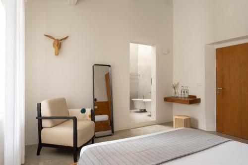 Ein Bett oder Betten in einem Zimmer der Unterkunft Podere Castellare