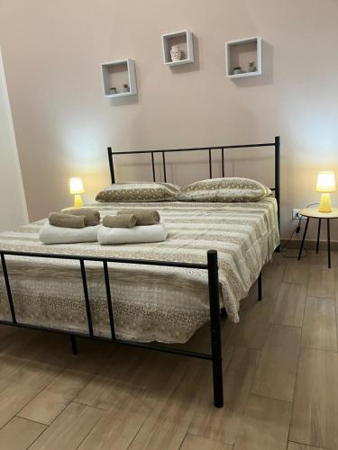 Postel nebo postele na pokoji v ubytování bayekou trapani