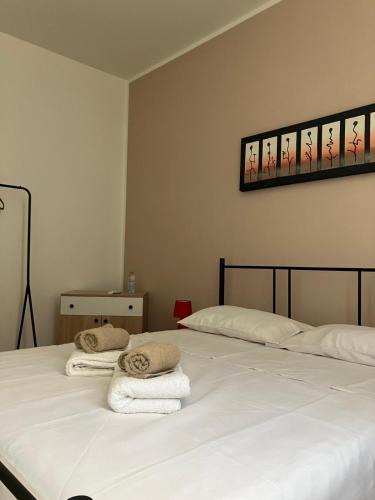 Postel nebo postele na pokoji v ubytování bayekou trapani