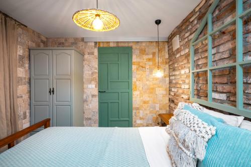 En eller flere senge i et værelse på Terra Apart