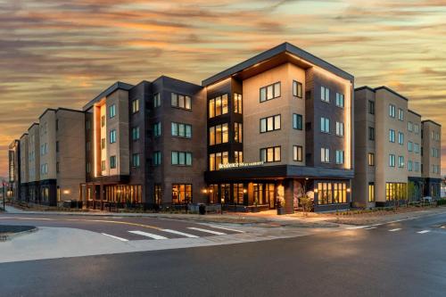 a building on the corner of a street at Residence Inn by Marriott Arvada Denver West in Arvada