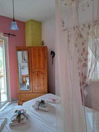 Postel nebo postele na pokoji v ubytování Xenios Milina