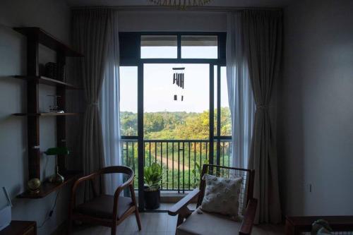 Posezení v ubytování Rustic Haven Lakeside Condo in Entebbe