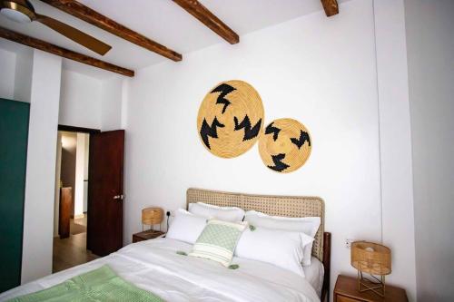 Postel nebo postele na pokoji v ubytování Rustic Haven Lakeside Condo in Entebbe