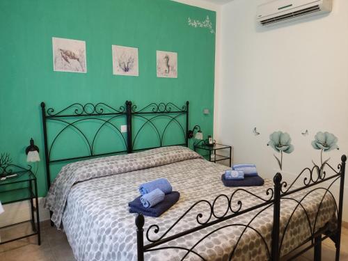 Ένα ή περισσότερα κρεβάτια σε δωμάτιο στο Ad Agros Logement