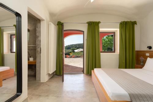 Ein Bett oder Betten in einem Zimmer der Unterkunft Podere Castellare