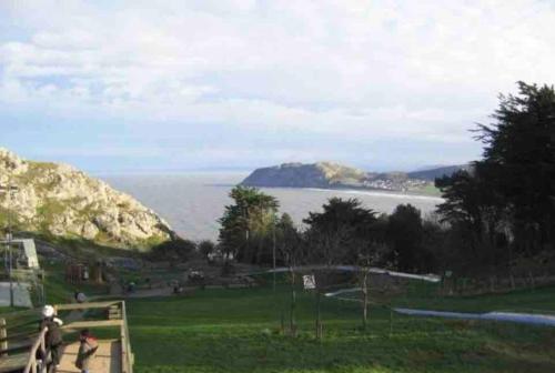 a group of people playing a game of volley ball at Orme Villa, Hot Tub, Llandudno, Stunning Views , sleeps 12 in Llandudno