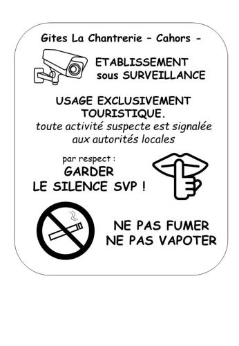 a sign that says no cameras and a no pass sign at La Chantrerie in Cahors