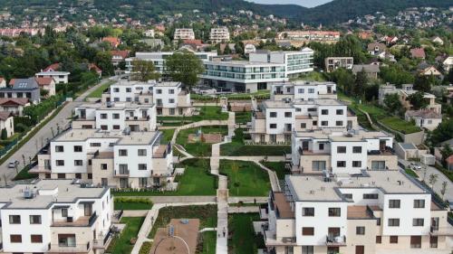 an aerial view of a city with houses at BIRGÉS Villapark Apartments in Balatonfüred