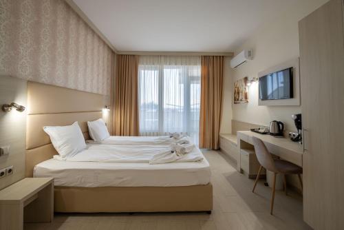 Katil atau katil-katil dalam bilik di Perla Apartments First Line