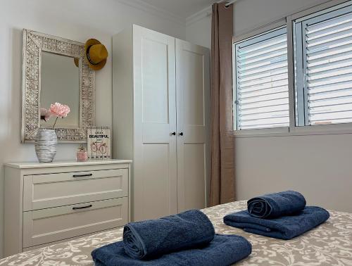 Ένα ή περισσότερα κρεβάτια σε δωμάτιο στο Hero Apartment - Luxury in Maspalomas