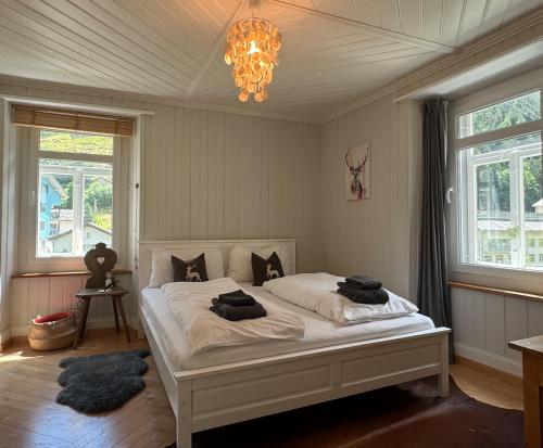 Postel nebo postele na pokoji v ubytování Alpine Haus