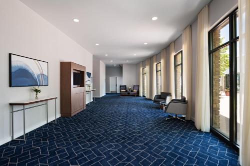 a hallway of a hospital with chairs and a room with windows at Courtyard by Marriott Boise West/Meridian in Boise