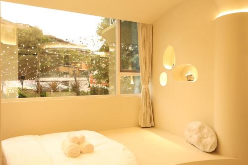 Cama o camas de una habitación en 大胡子民宿