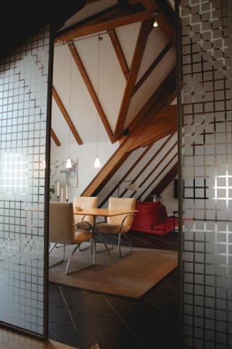 a dining room with a table and chairs at Gasthof zum Grünen Baum Komfort Suite in Rothenburg ob der Tauber