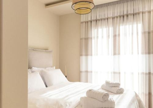 Letto o letti in una camera di Olive Boutique Villas