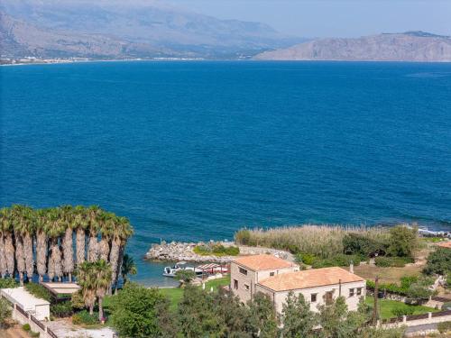 an aerial view of a house and the ocean at Villa Lygia in Petres
