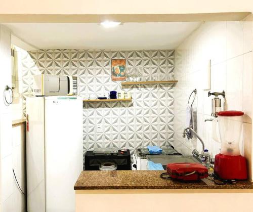 Kuchyň nebo kuchyňský kout v ubytování Apartamento na Orla de Copacabana