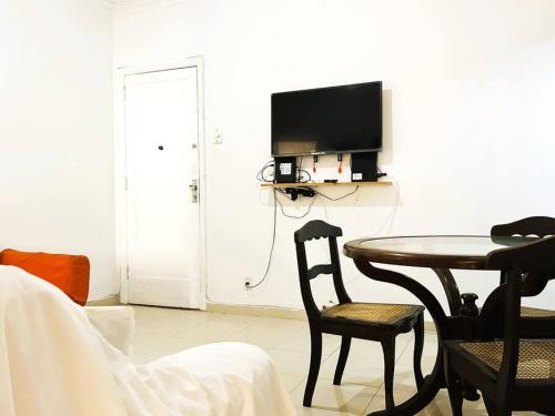 TV a/nebo společenská místnost v ubytování Apartamento na Orla de Copacabana