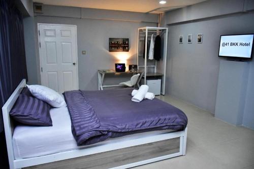 Ένα ή περισσότερα κρεβάτια σε δωμάτιο στο 41BKK Hotel Rama9