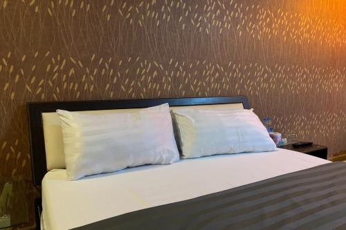 Ένα ή περισσότερα κρεβάτια σε δωμάτιο στο 41BKK Hotel Rama9