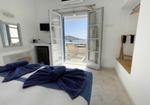 Photo de la galerie de l'établissement Glaros Hotel (By The Sea), à Ios Chora