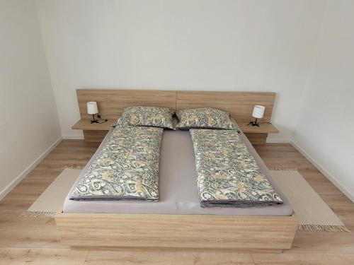 Una cama o camas en una habitación de Apartmán Neva Gbely 2