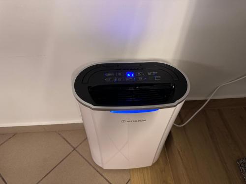 a trash can sitting next to a wall at NAFPAKTOS-luxury suite in Nafpaktos