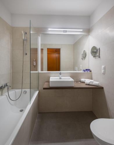 Ванная комната в Hotel Club Tihany