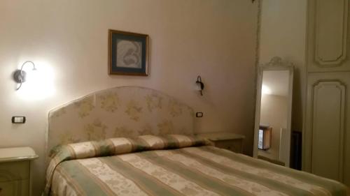 Ένα ή περισσότερα κρεβάτια σε δωμάτιο στο Casale Sant'Egidio - Lago di Bolsena