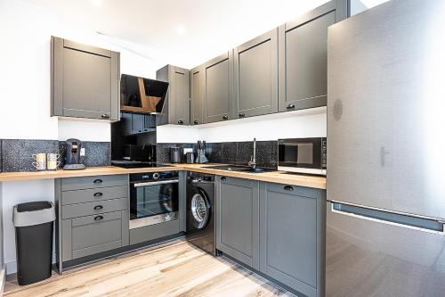 Photo de la galerie de l'établissement Cosy Appartement 6 pers 2 chambres Proche RER A Disney & Paris, à Neuilly-sur-Marne