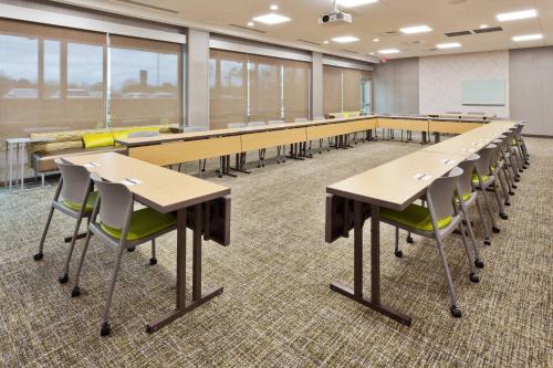a classroom with desks and chairs in a room at SpringHill Suites by Marriott Montgomery Prattville/Millbrook in Millbrook