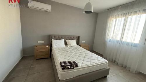 Кровать или кровати в номере Nicosia Dublex Daire