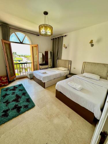 A bed or beds in a room at New Marina MP 37
