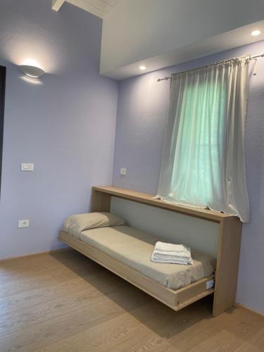 Cama o camas de una habitación en Albergo Residenziale Menhirs