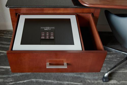 a wooden drawer with a tablet in it at Halifax Marriott Harbourfront Hotel in Halifax