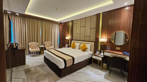 Postel nebo postele na pokoji v ubytování Concorde Deira Hotel -Formerly Golden Tulip Deira Hotel