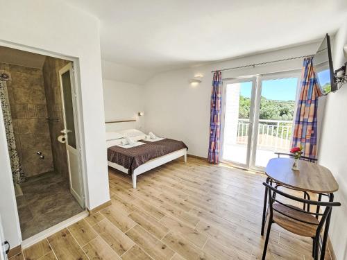 Posteľ alebo postele v izbe v ubytovaní Apartment Balota - Moreška-4 by Interhome