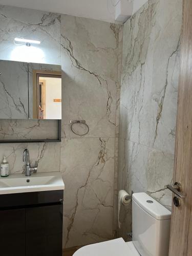 Kúpeľňa v ubytovaní Xronis apartments