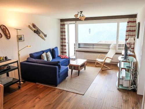 Posezení v ubytování Apartment Panorama da muntognas by Interhome