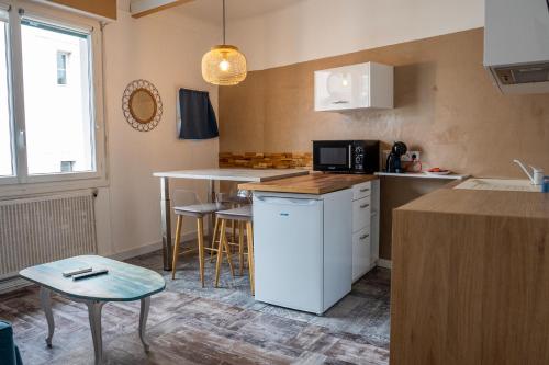 Kuchyň nebo kuchyňský kout v ubytování Mosaikhotel