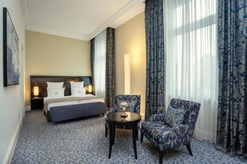 En eller flere senge i et værelse på Hotel Atlantic Hamburg, Autograph Collection