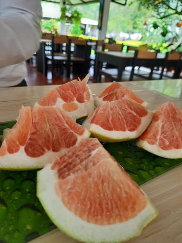 a group of grapefruit slices on a cutting board at Hotel Campestre El Triunfo in San Agustín