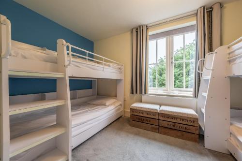 Postel nebo postele na pokoji v ubytování Seagate House