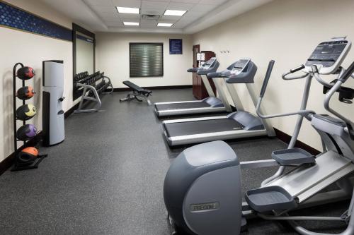 a gym with treadmills and elliptical machines at Residence Inn by Marriott Lakeland in Lakeland